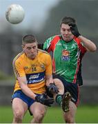 6 January 2013; Ian Mcinerney, Clare, in action against Sean Malone, Limerick Institute of Technology. McGrath Cup, Preliminary Round, Clare v Limerick Institute of Technology, St Josephs Miltown Malbay GAA Club, Miltown Malbay, Co. Clare. Picture credit: Diarmuid Greene / SPORTSFILE