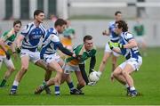 6 January 2013; Ross Brady, Offaly, in action against Brendan Quigley, far left, Paul Begley and Padraig McMahon, right, Laois. Bórd na Móna O'Byrne Cup, Group C, Offaly v Laois, O'Connor Park, Tullamore, Co. Offaly. Picture credit: Barry Cregg / SPORTSFILE