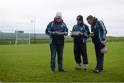 6 January 2013; UCD selectors Bobby O'Sullivan, left, Donncha O'Mahony and Willy O'Brien, right, look through the teams before the game. Bórd na Móna O'Byrne Cup, Group A, Louth v UCD, County Grounds, Drogheda, Co. Louth. Photo by Sportsfile