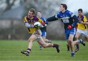 6 January 2013; PJ Banville, Wexford, in action against Mark Collins, DIT. Bórd na Móna O'Byrne Cup, Group D, Wexford v DIT, Kilanerin-Ballyfad GAA Club, Clonsilla, Gorey, Co. Wexford. Picture credit: Matt Browne / SPORTSFILE