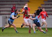 6 January 2013; Ronan Carroll, Louth, in action against Josh Hayes, left, and Garreth Ryan, UCD. Bórd na Móna O'Byrne Cup, Group A, Louth v UCD, County Grounds, Drogheda, Co. Louth. Photo by Sportsfile