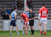 6 January 2013; Rory O'Carroll, UCD, is shown a red card and sent off by referee Joe Curley. Bórd na Móna O'Byrne Cup, Group A, Louth v UCD, County Grounds, Drogheda, Co. Louth. Photo by Sportsfile