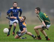 6 January 2013; Peter Foy, Longford, in action against Mickey Newman, Meath. Bórd na Móna O'Byrne Cup, Group A, Longford v Meath, Ballymahon GAA club, Ballymahon, Co. Longford. Picture credit: Brian Lawless / SPORTSFILE