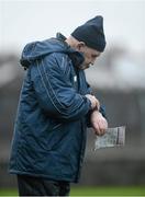 6 January 2013; Clare manager Mick O'Dwyer looks at his watch during the game. McGrath Cup, Preliminary Round, Clare v Limerick Institute of Technology, St Josephs Miltown Malbay GAA Club, Miltown Malbay, Co. Clare. Picture credit: Diarmuid Greene / SPORTSFILE