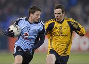 9 January 2013; Paul Hudson, Dublin, in action against Conor Boyle, DCU. Bórd na Móna O'Byrne Cup, Group B, Dublin v DCU, Parnell Park, Donnycarney, Dublin. Picture credit: Barry Cregg / SPORTSFILE