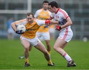 13 January 2013; Michael Polock, Antrim, in action against Aidan McCrory, Tyrone. Power NI Dr. McKenna Cup, Section C, Round 2, Antrim v Tyrone, Casement Park, Belfast, Co. Antrim. Picture credit: Oliver McVeigh / SPORTSFILE
