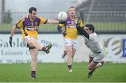 13 January 2013; Graeme Molloy, Wexford, in action against Mikey Conway, Kildare. Bórd na Móna O'Byrne Cup, Group D, Kildare v Wexford, St. Conleth's Park, Newbridge, Co. Kildare. Picture credit: Barry Cregg / SPORTSFILE