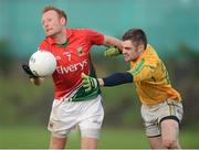 13 January 2013; Richie Feeney, Mayo, in action against Aan Wynne, Leitrim. Connacht FBD League Section B, Leitrim v Mayo, Páirc Seán O'Heslin, Ballinamore, Co. Leitrim. Picture credit: David Maher / SPORTSFILE