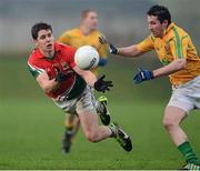 13 January 2013; Lee Keegan, Mayo, in action against Wayne McKeon, Leitrim. Connacht FBD League Section B, Leitrim v Mayo, Páirc Seán O'Heslin, Ballinamore, Co. Leitrim. Picture credit: David Maher / SPORTSFILE