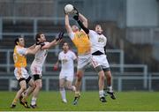 13 January 2013; Sean McVeigh, Antrim, in action against Plunkett Kane, Tyrone. Power NI Dr. McKenna Cup, Section C, Round 2, Antrim v Tyrone, Casement Park, Belfast, Co. Antrim. Picture credit: Oliver McVeigh / SPORTSFILE
