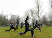 13 January 2013; Tipperary's Timmy Hammersley warms up before the start of the game against Offaly with his team-mates. Inter-County Challenge Match, Tipperary v Offaly, Templemore, Co. Tipperary. Picture credit: Matt Browne / SPORTSFILE