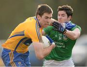 13 January 2013; Gary Brennan, Clare, in action against Ger Collins, Limerick. McGrath Cup Quarter-Final, Limerick v Clare, Pairc na nGael, Foynes, Co. Limerick. Picture credit: Stephen McCarthy / SPORTSFILE