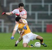 13 January 2013; Mattie Donnelly, Tyrone, in action against Colm Fleming, Antrim. Power NI Dr. McKenna Cup, Section C, Round 2, Antrim v Tyrone, Casement Park, Belfast, Co. Antrim. Picture credit: Oliver McVeigh / SPORTSFILE