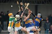 13 January 2013; Offaly players, from left, Pat Camon, and Kevin Brady in action against Timmy Hammersley, Noel McGrath and Johnny Ryan, Tipperary. Inter-County Challenge Match, Tipperary v Offaly, Templemore, Co. Tipperary. Picture credit: Matt Browne / SPORTSFILE