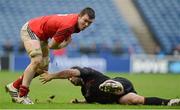 13 January 2013; Peter O'Mahony, Munster, is tackled by Steve Lawrie, Edinburgh. Heineken Cup, Pool 1, Round 5, Edinburgh v Munster, Murrayfield Stadium, Edinburgh, Scotland. Picture credit: Diarmuid Greene / SPORTSFILE