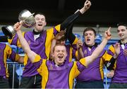 15 January 2013; CBS Wexford captain Collie Joyce Ahearne lifts the cup alongside his team-mates. Senior Development Cup Final, CBS Wexford v Ratoath C.C, Donnybrook Stadium, Donnybrook, Dublin. Picture credit: David Maher / SPORTSFILE