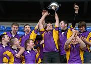 15 January 2013; David Kavanagh, CBS Wexford, lifts the cup alongside his team-mates. Senior Development Cup Final, CBS Wexford v Ratoath C.C, Donnybrook Stadium, Donnybrook, Dublin. Picture credit: David Maher / SPORTSFILE