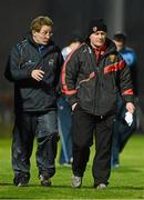 16 January 2013; Down manager James McCartan, right, and assistant manager Niall Moyna in discussion as they leave the field at half time. Power NI Dr. McKenna Cup, Section B, Round 3, Down v Armagh, Pairc Esler, Newry, Co. Down. Picture credit: Oliver McVeigh / SPORTSFILE