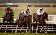 19 January 2013; Morning Assembly, right, with Davy Russell up, clears the last on the way to winning the I.N.H. Stallion Owners European Breeders Fund Maiden Hurdle, ahead of second place finisher Mad Brian, with Fergal Harford up, and third place finisher Kashline, left, with Barry O'Neill up. Naas Racecourse, Naas, Co. Kildare. Photo by Sportsfile