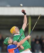 19 January 2013; David Breen, Limerick, in action against Darragh O'Carroll, Mary Immaculate College. Waterford Crystal Cup, Senior Hurling Preliminary Round, Limerick v Mary Immaculate College, John Fitzgerald Park, Kilmallock, Co. Limerick. Picture credit: Diarmuid Greene / SPORTSFILE