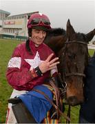 19 January 2013; Jockey Davy Russell celebrates after winning the Irish Stallion Farms European Breeders Fund Irish Racing Writers Novice Hurdle, and his fourth race of the day. Naas Racecourse, Naas, Co. Kildare. Photo by Sportsfile