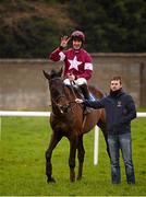 19 January 2013; Jockey Davy Russell, aboard Un Atout, celebrates after winning the Irish Stallion Farms European Breeders Fund Irish Racing Writers Novice Hurdle, and his fourth race of the day. Naas Racecourse, Naas, Co. Kildare. Photo by Sportsfile