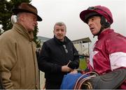 19 January 2013; Jockey Davy Russell, after winning the Irish Stallion Farms European Breeders Fund Irish Racing Writers Novice Hurdle aboard Un Atout with trainer Willie Mullins, left, and owner Michael O'Leary, from the Gigginstown House Stud. Naas Racecourse, Naas, Co. Kildare. Photo by Sportsfile