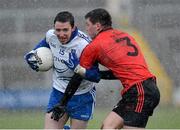 20 January 2013; Owen Duffy, Monaghan, in action against Peter Turley, Down. Power NI Dr. McKenna Cup, Semi-Final, Monaghan v Down, Athletic Grounds, Armagh. Picture credit: Oliver McVeigh / SPORTSFILE