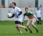 20 January 2013; Sean Johnston,  Kildare, in action against Sean Pender, Offlay. Bórd na Móna O'Byrne Cup, Semi-Final, Offaly v Kildare, O'Connor Park, Tullamore, Co. Offaly. Picture credit: David Maher / SPORTSFILE