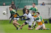 20 January 2013; Sean Johnston, Kildare, in action against Paul McConway, left, Derek Kelly and Graham Guilfoyle, right, Offlay. Bórd na Móna O'Byrne Cup, Semi-Final, Offaly v Kildare, O'Connor Park, Tullamore, Co. Offaly. Picture credit: David Maher / SPORTSFILE