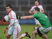 20 January 2013; Connor McAliskey, Tyrone, in action against Shane Lyons, Fermanagh. Power NI Dr. McKenna Cup, Semi-Final, Tyrone v Fermanagh, Athletic Grounds, Armagh. Picture credit: Oliver McVeigh / SPORTSFILE