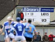 20 January 2013; Scoreboard officials watch the game. Bord na M—na Walsh Cup, First Round, Laois v UCD, Rathdowney-Errill GAA Club, Kelly Daly Park, Rathdowney, Co. Laois. Picture credit: Dáire Brennan / SPORTSFILE