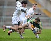 20 January 2013; Anton Sullivan, Offaly, in action against Mikey Conway, Kildare. Bórd na Móna O'Byrne Cup, Semi-Final, Offaly v Kildare, O'Connor Park, Tullamore, Co. Offaly. Picture credit: David Maher / SPORTSFILE