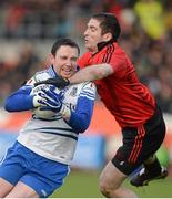 20 January 2013; Owen Duffy, Monaghan, in action against Aidan Carr, Down. Power NI Dr. McKenna Cup, Semi-Final, Monaghan v Down, Athletic Grounds, Armagh. Picture credit: Oliver McVeigh / SPORTSFILE