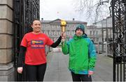 24 January 2013; Special Olympics athlete Gary Burton, from Sallynoggin, Dublin, joins Louise Moran of An Garda Siochana for The Law Enforcement Torch Run as they pay a visit to Leinster House. Gary is one of 14 athletes who will represent Ireland at the 2013 Special Olympics World Winter Games in PyeongChang, South Korea, from 29th January to 5th February. For further information about Team Ireland’s participation at these Games visit www.specialolympics.ie/wintergames. Leinster House, Dublin. Picture credit: Barry Cregg / SPORTSFILE