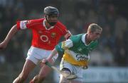 22 March 2003; Michael Cordial, Offaly, in action against Setanta O hAilpin, Cork. Allianz National Hurling League, Offaly v Cork, St. Brendans Park, Birr, Co. Offaly. Picture credit; David Maher / SPORTSFILE *EDI*