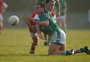 22 March 2003; Jason Stokes, Limerick, in action against Aaron Hoey, Louth. Allianz National Football League Division 2A, Louth v Limerick, Pairc Mhuire, Ardee, Co. Louth. Picture credit; Damien Eagers / SPORTSFILE *EDI*