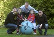 4 April 2003; Bohemians Colin Hawkins pictured with Bohs fan Jordon Lawless, age five, Stephen McGuinness, Chairman of the PFAI and Shelbourne's Jason Byrne pictured with Shels fan Ruth Cullen, age five, at the launch of summer soccer for the Eircom League, Herbert Park, Dublin. Picture credit; Matt Browne / SPORTSFILE *EDI*
