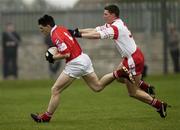 6 April 2003; Michael O Croinin, Cork, in action against Tyrone's Colin Holmes. Allianz National Football League, Division 1A, Tyrone v Cork, O'Neill Park, Dungannon, Co. Tyrone. Football. Picture credit; Damien Eagers / SPORTSFILE *EDI*