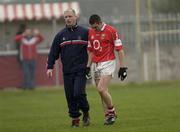 6 April 2003; Cork's Noel O'Leary pictured next to team manager Larry Tompkins after he was sent off. Allianz National Football League, Division 1A, Tyrone v Cork, O'Neill Park, Dungannon, Co. Tyrone. Football. Picture credit; Damien Eagers / SPORTSFILE *EDI*
