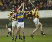 13 April 2003; Kilkenny's James Coogan, left, and Martin Comerford in action against Eamonn Corcoran, Tipperary. Allianz National Hurling League, Division 1, Kilkenny v Tipperary, Nowlan Park, Kilkenny. Hurling. Picture credit; Damien Eagers / SPORTSFILE *EDI*
