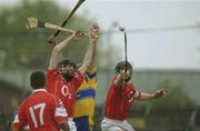 13 April 2003; Tony Carmody, Clare, in action against Cork players Diarmuid O'Sullivan, 17, Pat Mulcahy and Wayne Sherlock, right. Allianz National Hurling League, Division 1, Clare v Cork, Cusack Park, Ennis, Co. Clare. Hurling. Picture credit; Ray McManus / SPORTSFILE *EDI*