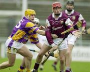 13 April 2003; Brian O'Mahony, Galway, in action against Wexford's Michael Jordan. Allianz National Hurling League, Division 1, Galway v Wexford, Pearse Stadium, Galway. Picture credit; SPORTSFILE