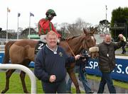 26 January 2013; Owners Adrian Shiels, left, and Niall Reilly lead in Benefficient, with Bryan Cooper up, after winning the Frank Ward Solicitors Arkle Novice Steeplechase. Leopardstown Racecourse, Leopardstown, Co. Dublin. Picture credit: Brendan Moran / SPORTSFILE