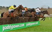 26 January 2013; Texas Jack, centre, with Paul Carberry up, leads Mount Benbulben, left, with Davy Russell up, and Marito, with Paul Townend up, as they jump the last on their way to winning the Boylesports.com - Bet On Your Mobile Novice Steeplechase. Leopardstown Racecourse, Leopardstown, Co. Dublin. Picture credit: Brendan Moran / SPORTSFILE