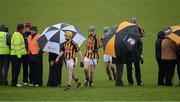 26 January 2013; Kilkenny players from left, Conor Martin, Joe Holden, Jason Corcoran and Owen McGrath make their way through patrons and officials on their way to the team dressing room at half time. Bórd na Móna Walsh Cup, Second Round, Kilkenny v NUIG, O'Loughlin Gaels GAA Club, Kilkenny. Picture credit: Ray McManus / SPORTSFILE