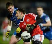 26 January 2013; Mark Donnelly, Tyrone, in action against Darren Hughes, Monaghan. Power NI Dr. McKenna Cup Final, Tyrone v Monaghan, Athletic Grounds, Armagh. Picture credit: Oliver McVeigh / SPORTSFILE