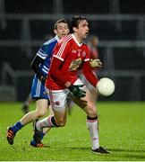 26 January 2013; Joe McMahon, Tyrone, in action against Martin McElroy, Monaghan. Power NI Dr. McKenna Cup Final, Tyrone v Monaghan, Athletic Grounds, Armagh. Picture credit: Oliver McVeigh / SPORTSFILE