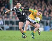 27 January 2013; Adrian Croal, Leitrim, in action against Neil Ewing, Sligo. Connacht FBD League Home Final, Sligo v Leitrim, Markievicz Park, Sligo. Picture credit: David Maher / SPORTSFILE