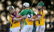 27 January 2013; David Kenny, Offaly, in action against P.J. Nolan and Gary Moore, right, Wexford. Bórd na Móna Walsh Cup, Second Round, Wexford v Offaly, Wexford v Offaly, Pairc Naomh Brid, Blackwater GAA Club, Co. Wexford. Picture credit: Ray McManus / SPORTSFILE